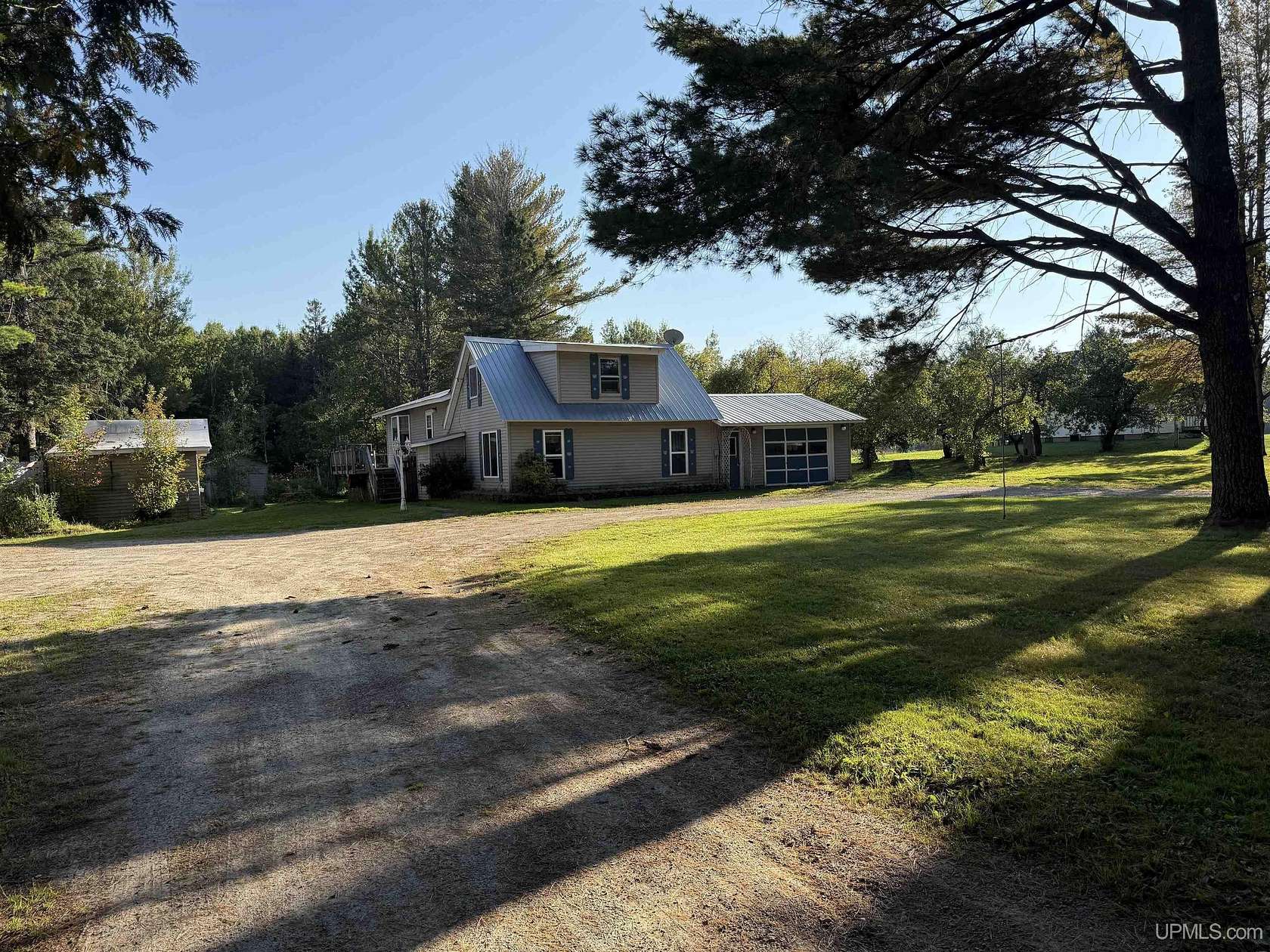 2.19 Acres of Residential Land with Home for Sale in Rock, Michigan