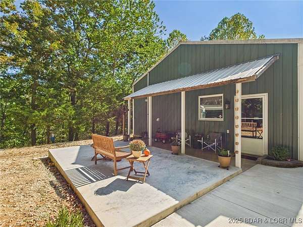 44 Acres of Recreational Land with Home for Sale in Gravois Mills, Missouri