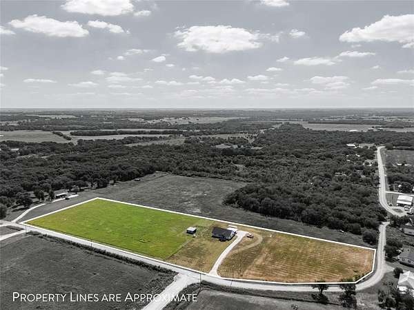 6 Acres of Residential Land with Home for Sale in Aquilla, Texas