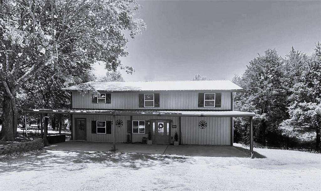 52.2 Acres of Agricultural Land with Home for Sale in Bonham, Texas