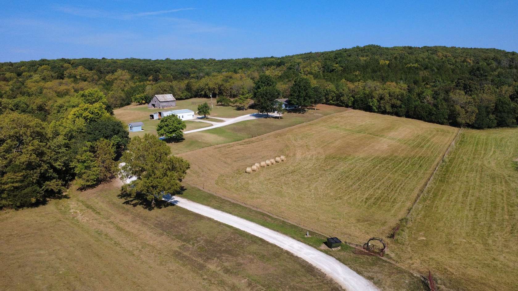 80.9 Acres of Land with Home for Sale in Collins, Missouri
