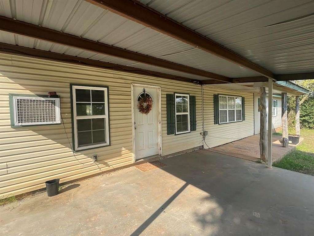 7 Acres of Land with Home for Sale in Wanette, Oklahoma