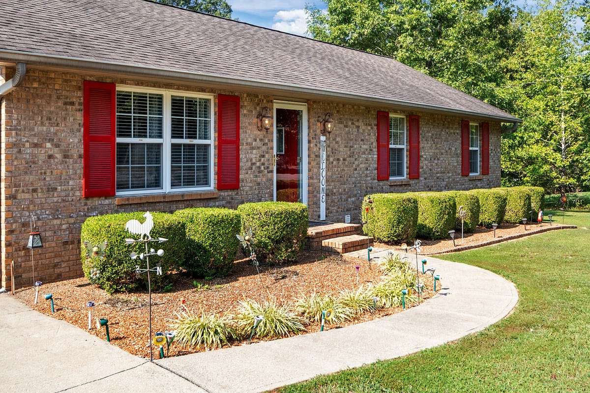 1.69 Acres of Residential Land with Home for Sale in New Johnsonville, Tennessee