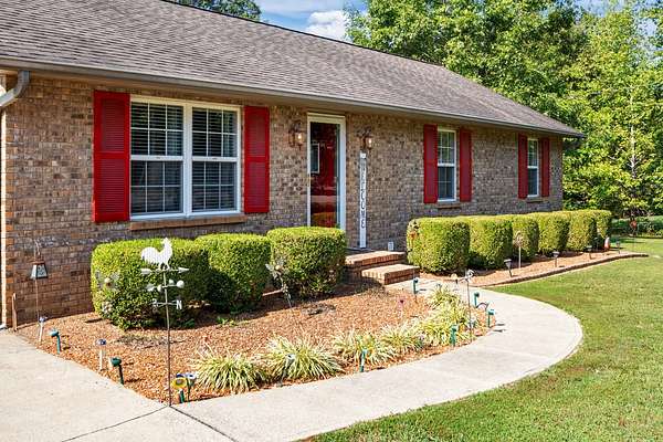 1.69 Acres of Residential Land with Home for Sale in New Johnsonville, Tennessee