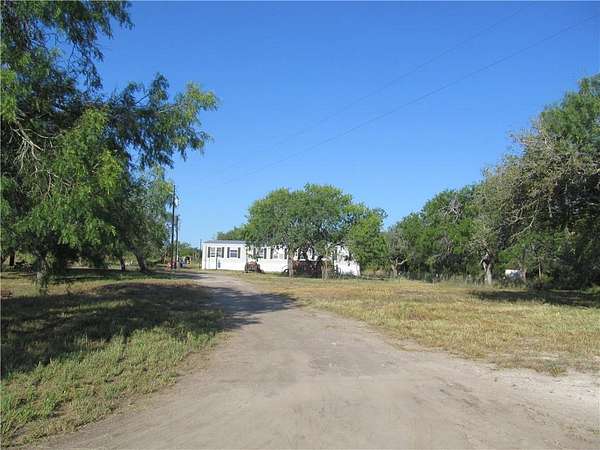 5 Acres of Residential Land with Home for Sale in Sandia, Texas