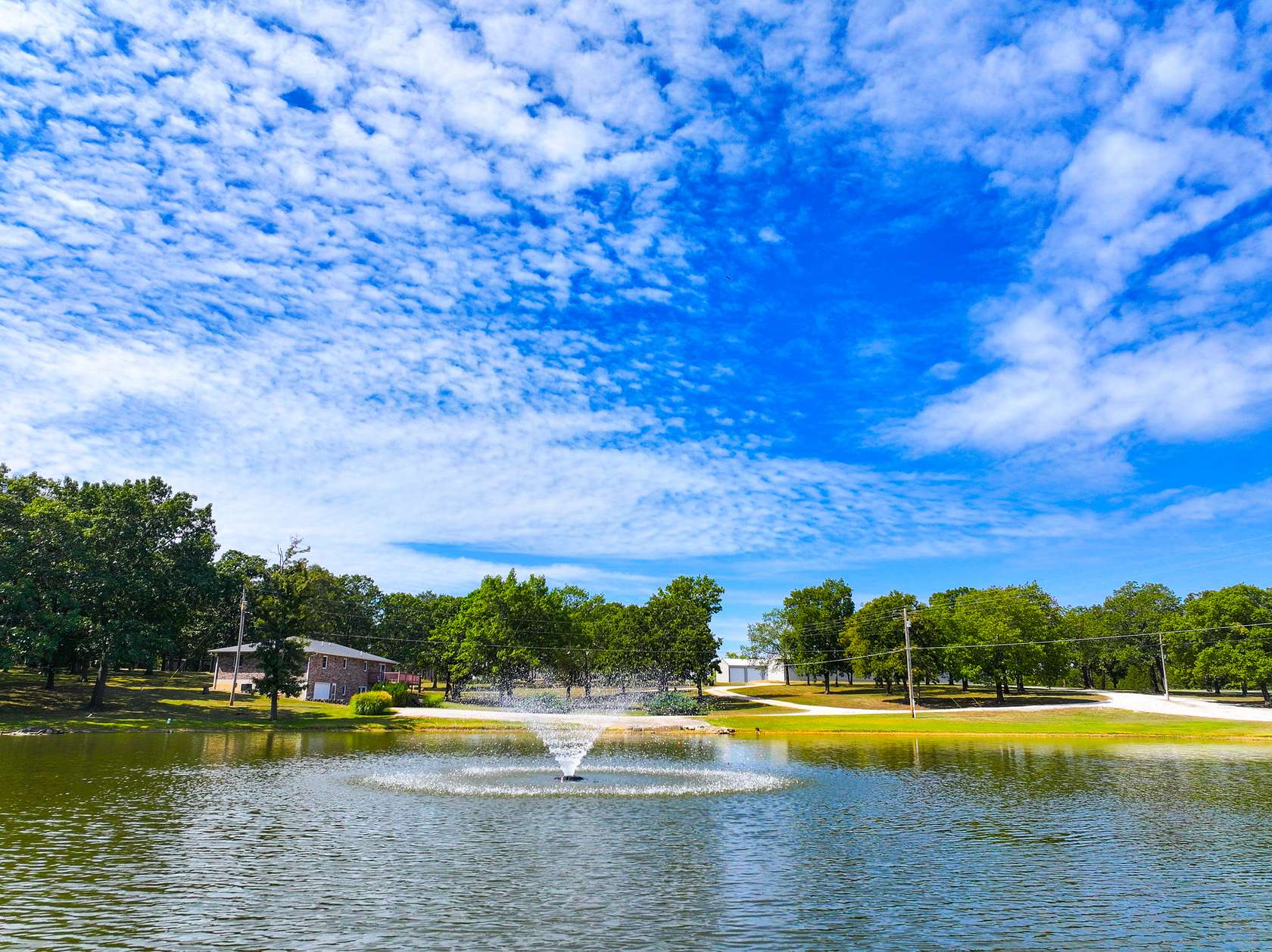 9 Acres of Residential Land with Home for Sale in Wheatland, Missouri