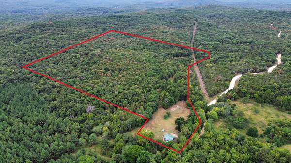 32 Acres of Recreational Land with Home for Sale in Melbourne, Arkansas