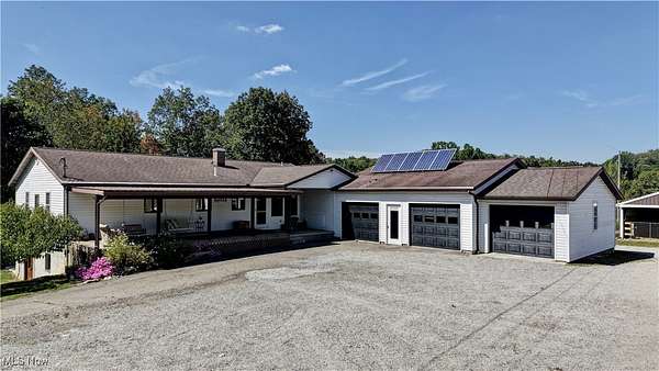 5.64 Acres of Land with Home for Auction in Fresno, Ohio