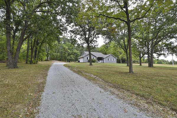 5 Acres of Residential Land with Home for Sale in Bolivar, Missouri