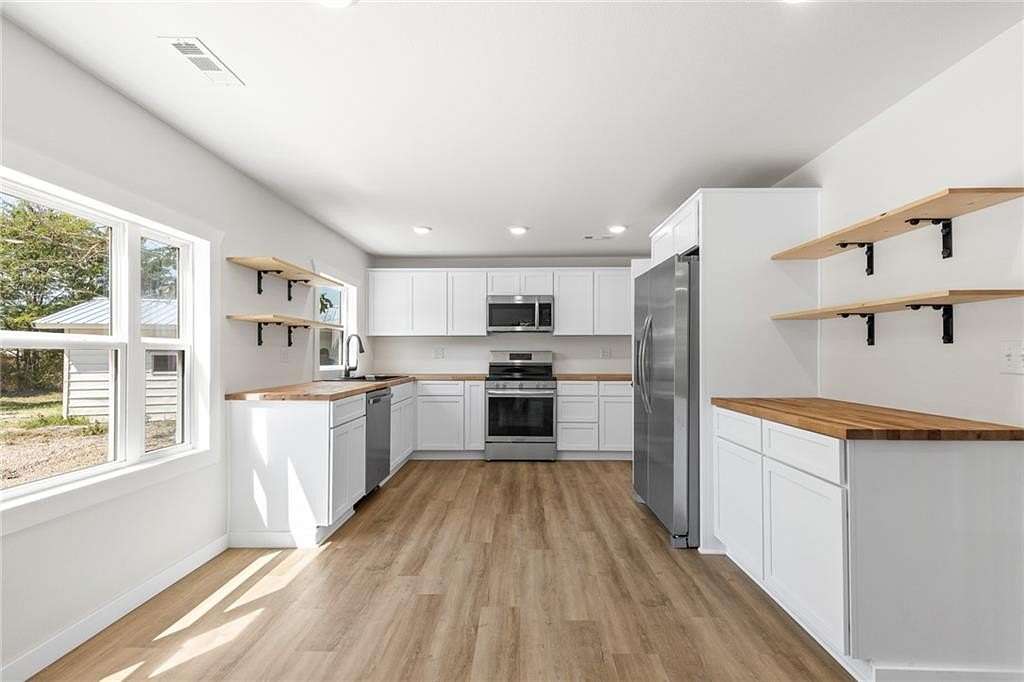 2 Acres of Residential Land with Home for Sale in Harrison, Arkansas