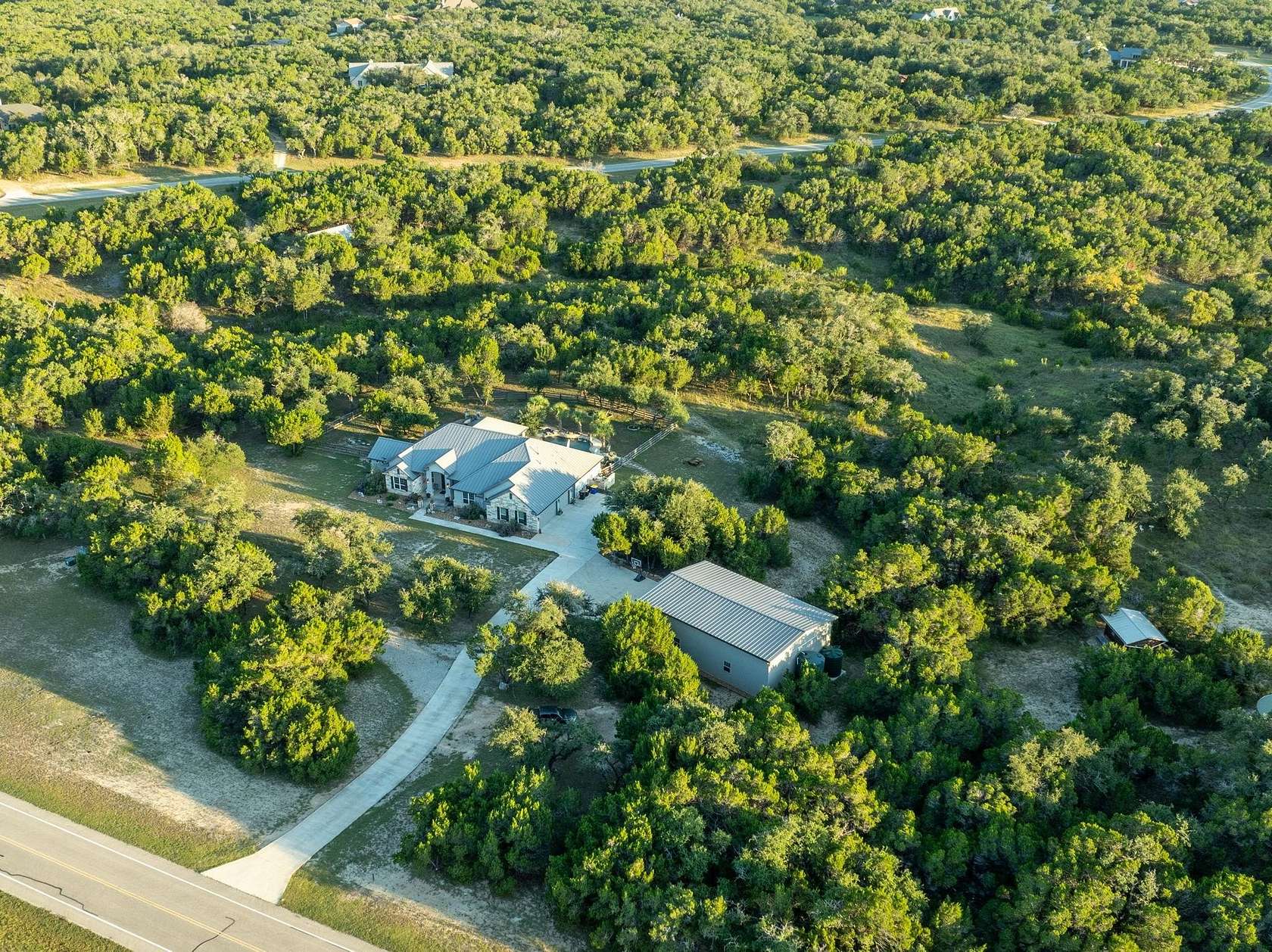 5 Acres of Residential Land with Home for Sale in Wimberley, Texas