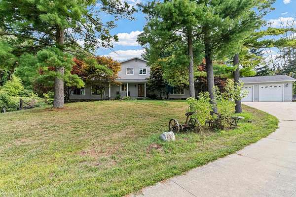 22.8 Acres of Land with Home for Sale in Fenton, Michigan