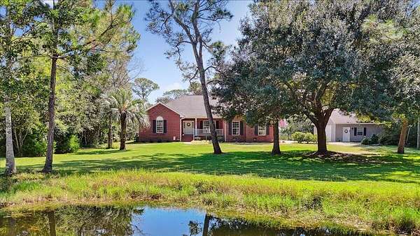 3.7 Acres of Residential Land with Home for Sale in Milton, Florida