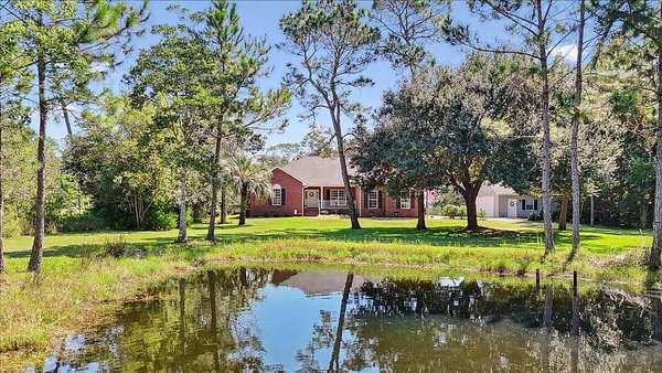 3.7 Acres of Residential Land with Home for Sale in Milton, Florida