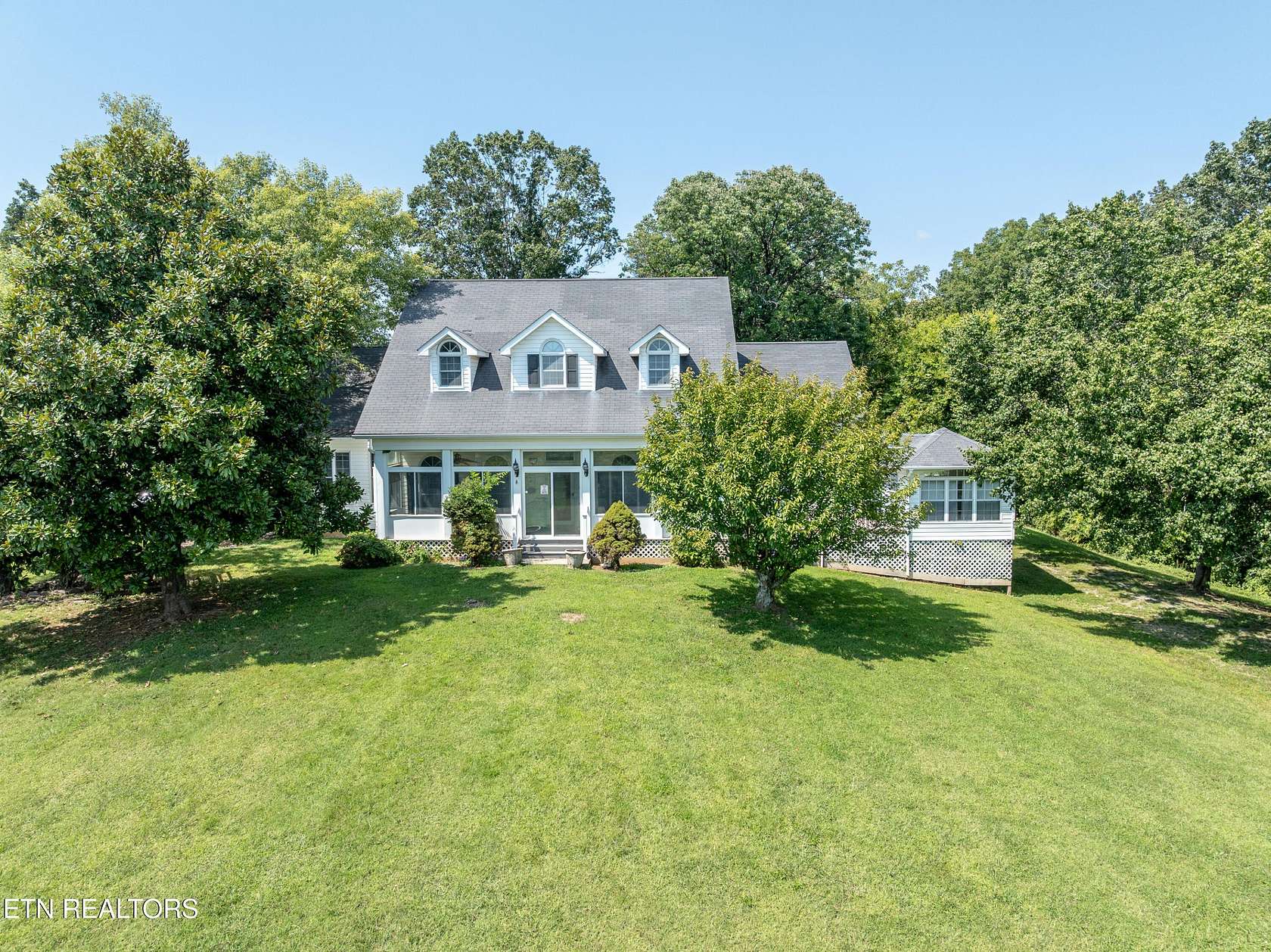 3.77 Acres of Residential Land with Home for Sale in Friendsville, Tennessee