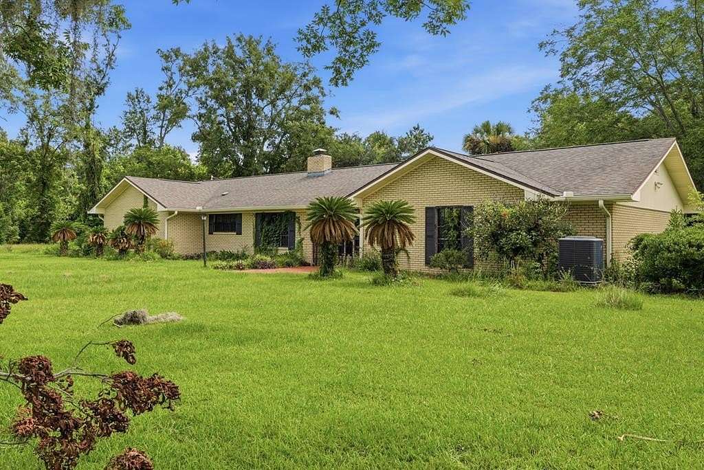 1.53 Acres of Land with Home for Sale in Wewahitchka, Florida