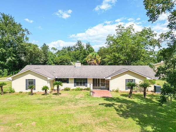 1.53 Acres of Residential Land with Home for Sale in Wewahitchka, Florida