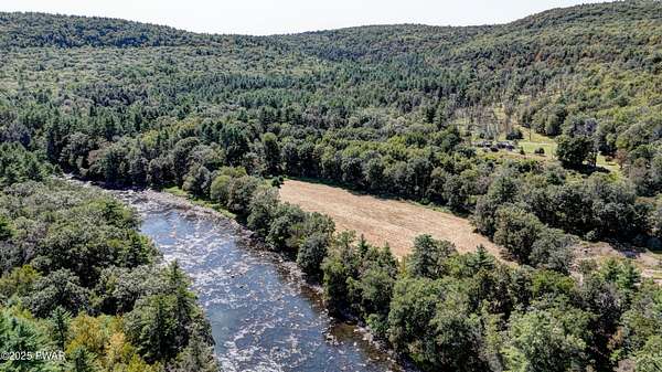 13.3 Acres of Land with Home for Sale in Lackawaxen, Pennsylvania