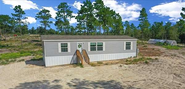 5 Acres of Land with Home for Sale in Morriston, Florida