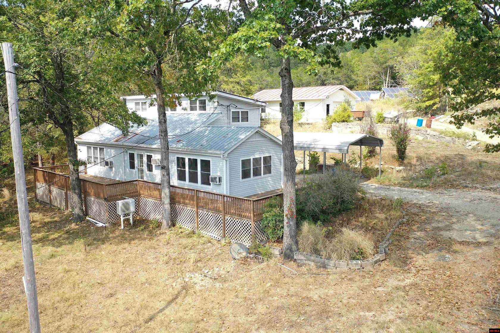 27.6 Acres of Agricultural Land with Home for Sale in Calico Rock, Arkansas