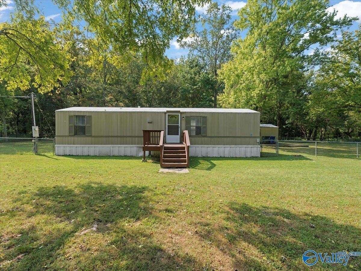 3.2 Acres of Residential Land with Home for Sale in New Market, Alabama