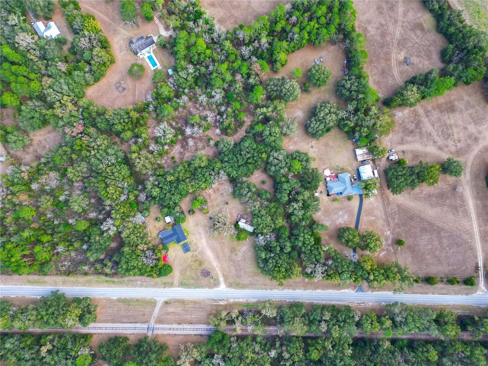 5.27 Acres of Land with Home for Sale in Alachua, Florida