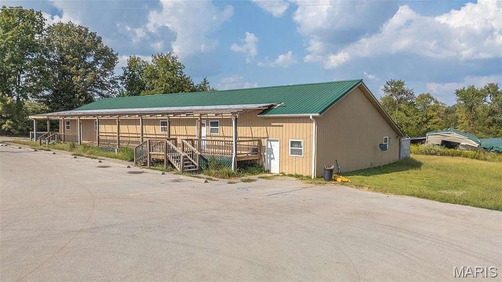 7.5 Acres of Improved Mixed-Use Land for Sale in Fairdealing, Missouri