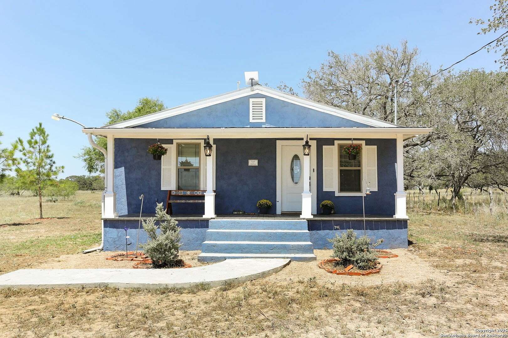 10 Acres of Residential Land with Home for Sale in Poteet, Texas