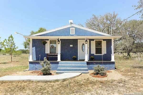 10 Acres of Residential Land with Home for Sale in Poteet, Texas