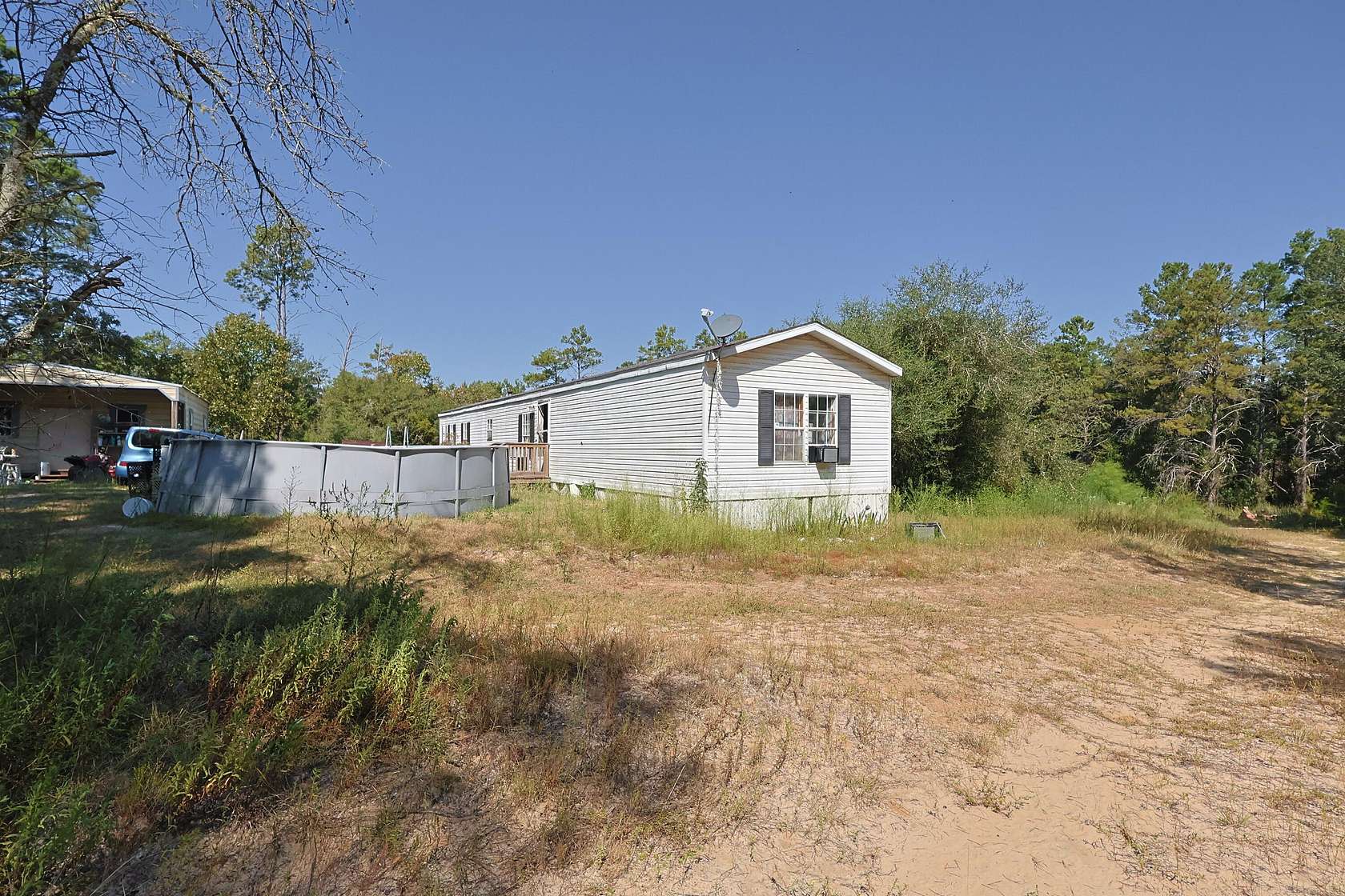 5 Acres of Residential Land with Home for Sale in Freeport, Florida