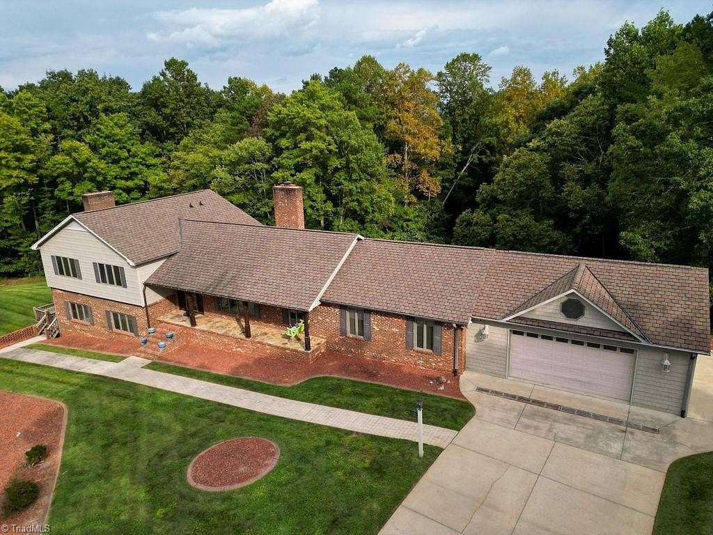 1.8 Acres of Residential Land with Home for Sale in Siloam, North Carolina