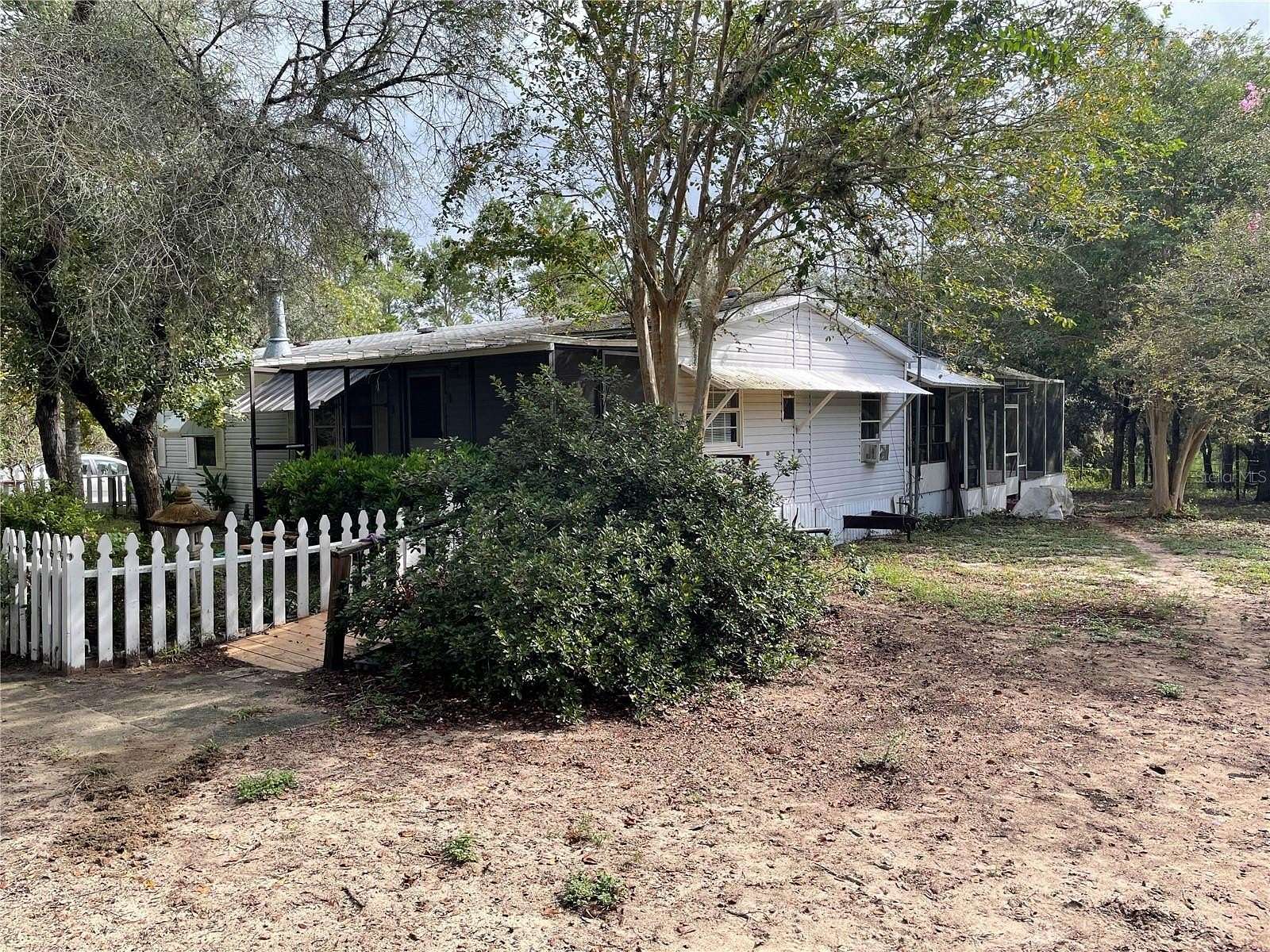 26.3 Acres of Agricultural Land with Home for Sale in Ocklawaha, Florida