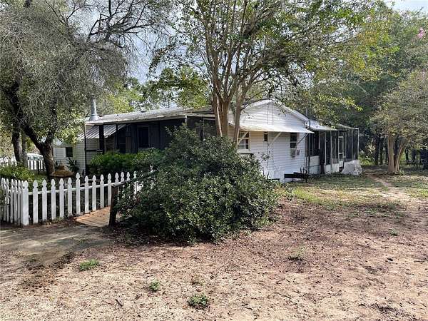 26.3 Acres of Agricultural Land with Home for Sale in Ocklawaha, Florida
