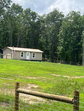 5 Acres of Residential Land with Home for Sale in Monterey, Tennessee