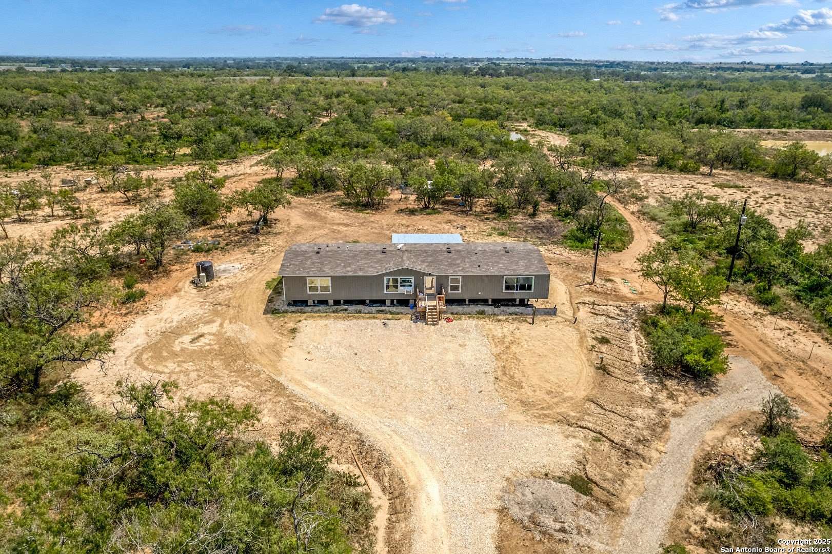5.5 Acres of Land with Home for Sale in Floresville, Texas