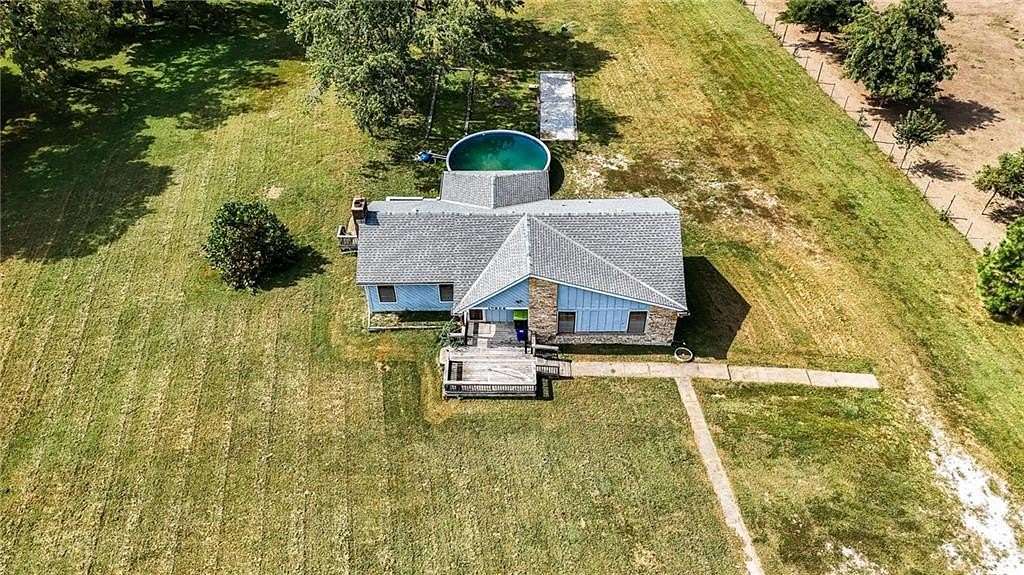 3.3 Acres of Residential Land with Home for Sale in Belton, Missouri