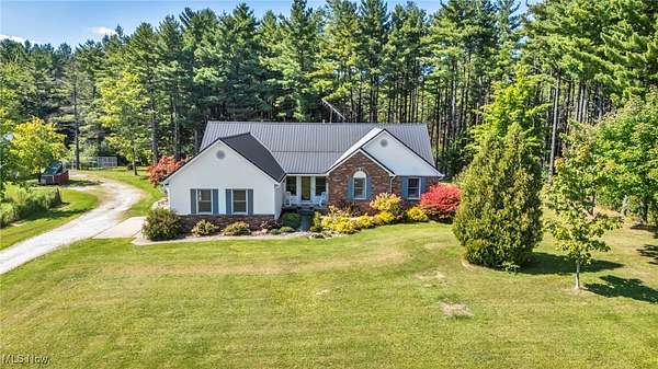 4 Acres of Residential Land with Home for Sale in Thompson, Ohio