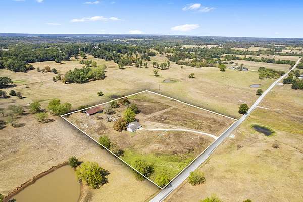 10 Acres of Land with Home for Sale in Walnut Grove, Missouri