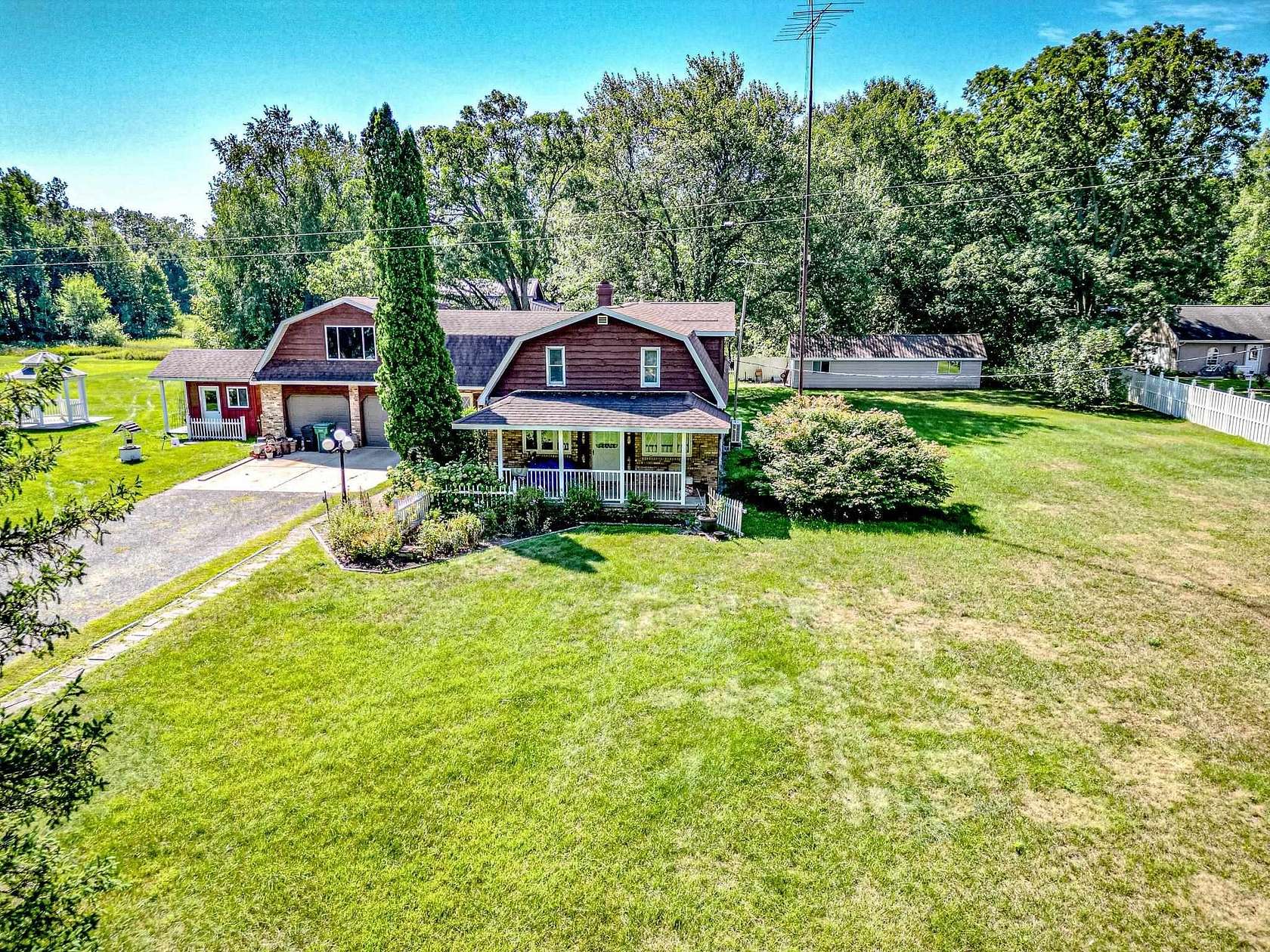 79.6 Acres of Land with Home for Sale in Harrison, Michigan