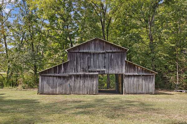 21.3 Acres of Land with Home for Sale in Ashland City, Tennessee