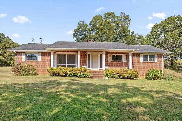 11 Acres of Land with Home for Sale in Harrison, Tennessee