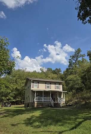4 Acres of Residential Land with Home for Sale in Oldfield, Missouri