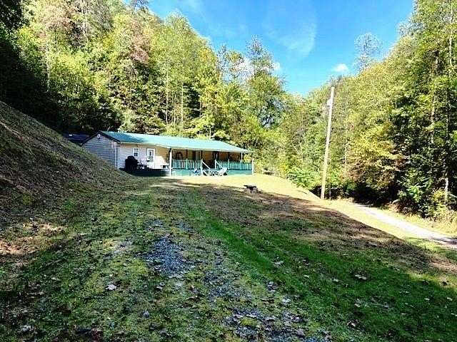 10.4 Acres of Land with Home for Sale in McAndrews, Kentucky