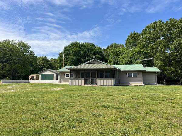 63.7 Acres of Land with Home for Sale in Drury, Missouri