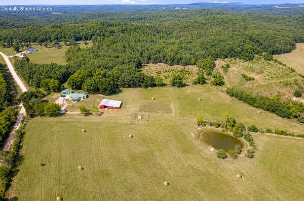 63.7 Acres of Land with Home for Sale in Drury, Missouri