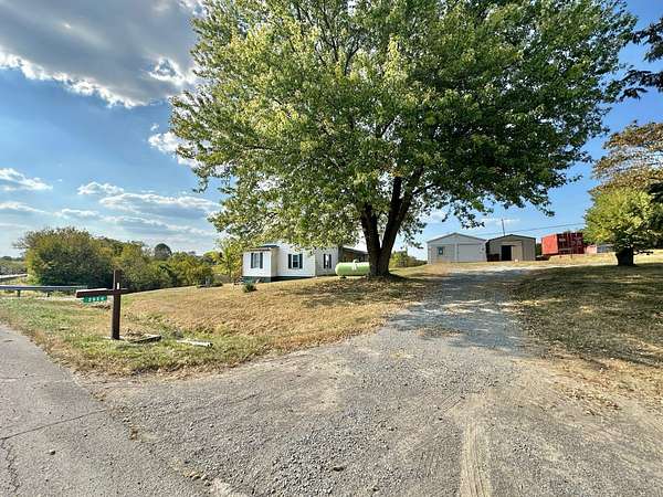 5 Acres of Residential Land with Home for Sale in Ewing, Kentucky