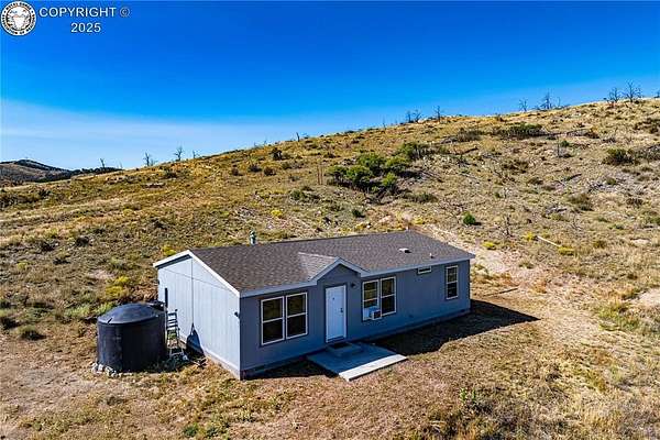 5 Acres of Land with Home for Sale in Cotopaxi, Colorado