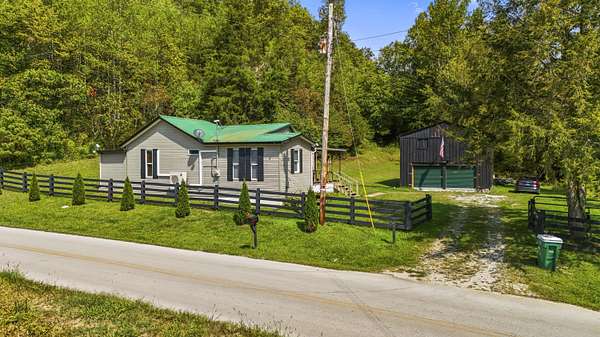 10 Acres of Land with Home for Sale in Campton, Kentucky