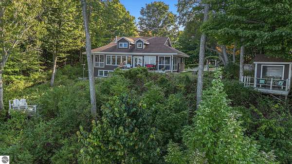 2.5 Acres of Residential Land with Home for Sale in Beulah, Michigan