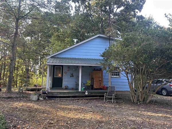 9.1 Acres of Residential Land with Home for Sale in Henderson, Tennessee